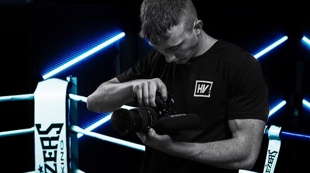 Lloyd Hunt working with camera equipment